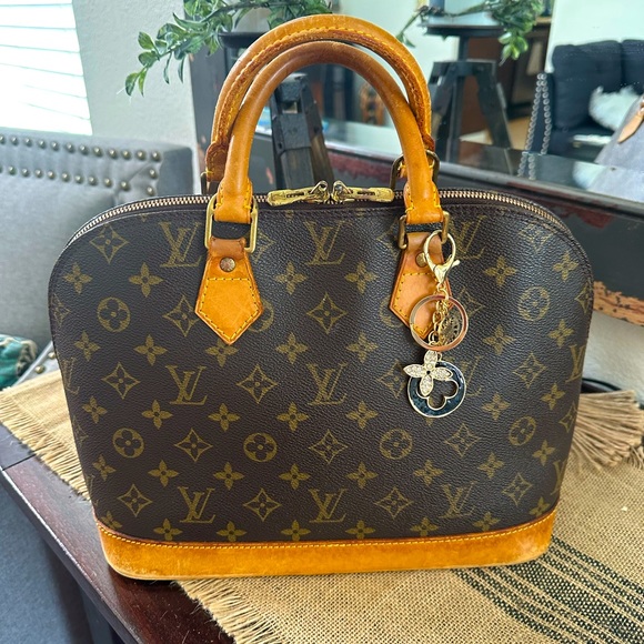 Louis Vuitton Handbags - Louis Vuitton Vintage Monogram Canvas
Alma PM Satchel